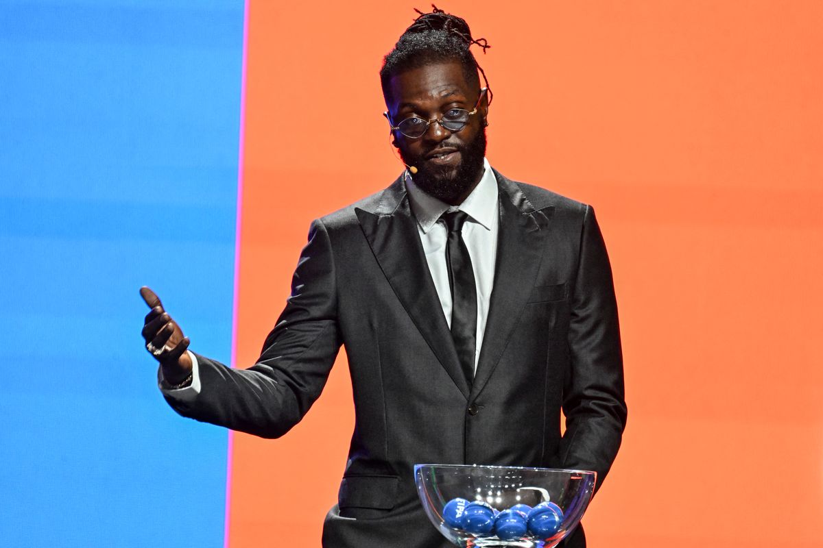 Emmanuel Adebayor at the CAF World Cup qualifying draw in 2023