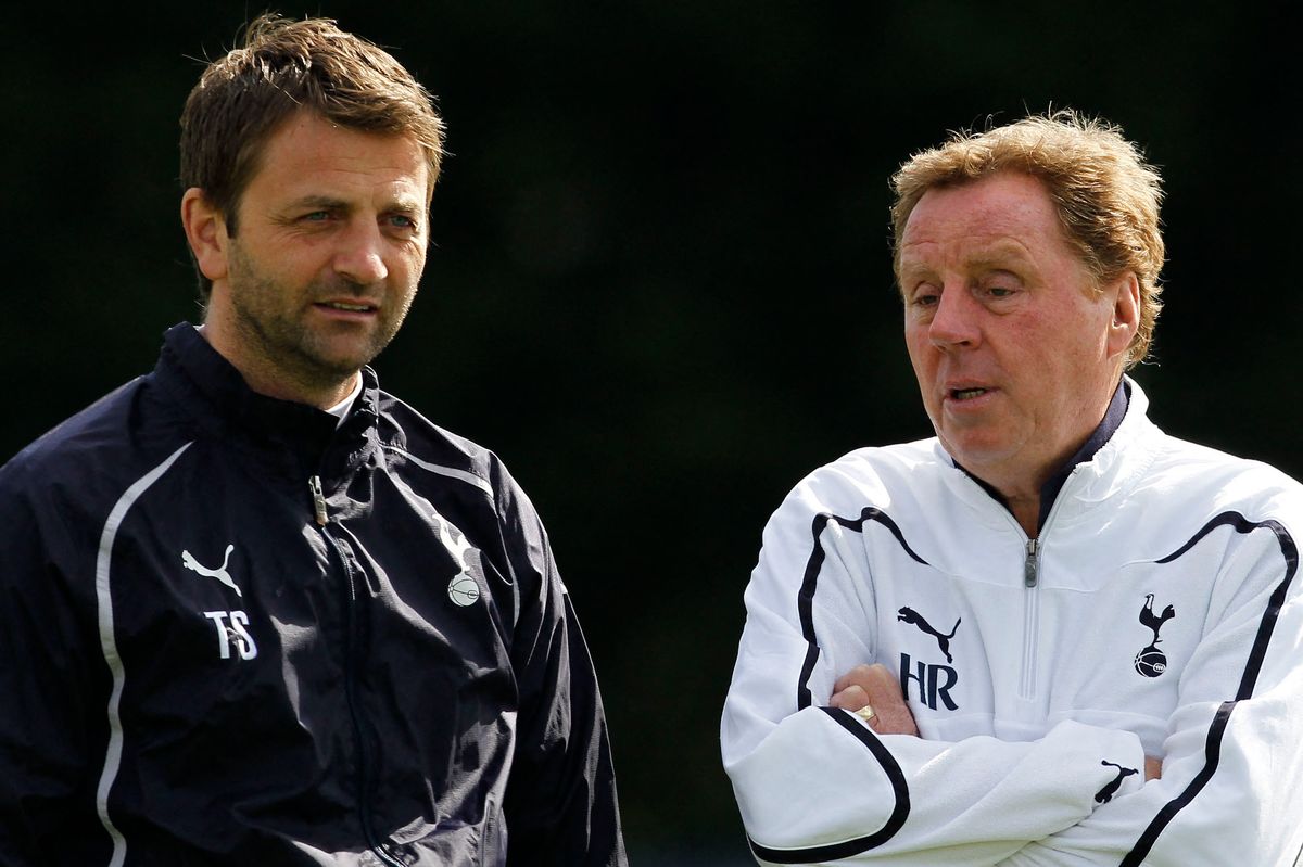 Manager of Tottenham Hotspur Harry Redknapp (R) talks to assistant Tim Sherwood during a training session at the club's training facility in north London, on April 12, 2011. Tottenham Hotspur are set to play Real Madrid in a UEFA Champions League Quarter Final, 2nd leg football match on Wednesday. 