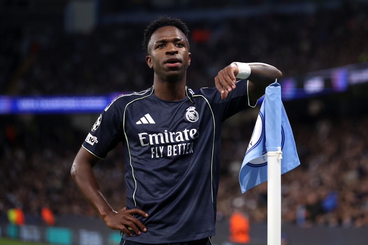 Vinicius Junior of Real Madrid celebrates scoring his team's first goal from the penalty spot during the UEFA Champions League 2025/26 Round of 16 Second Leg match between Manchester City FC and Real Madrid CF at City of Manchester Stadium on March 17, 2026 in Manchester, England