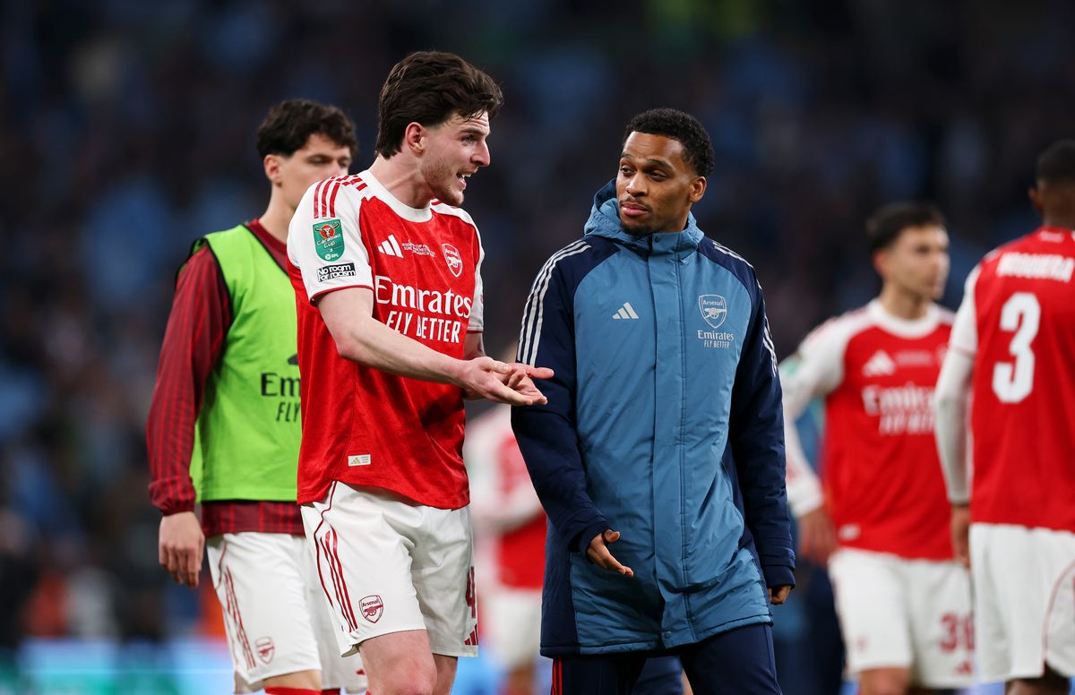 Declan Rice and Jurrien Timber of Arsenal react after the team's defeat in the Carabao Cup Final match between Arsenal and Manchester City at Wembley Stadium on March 22, 2026 in London, England