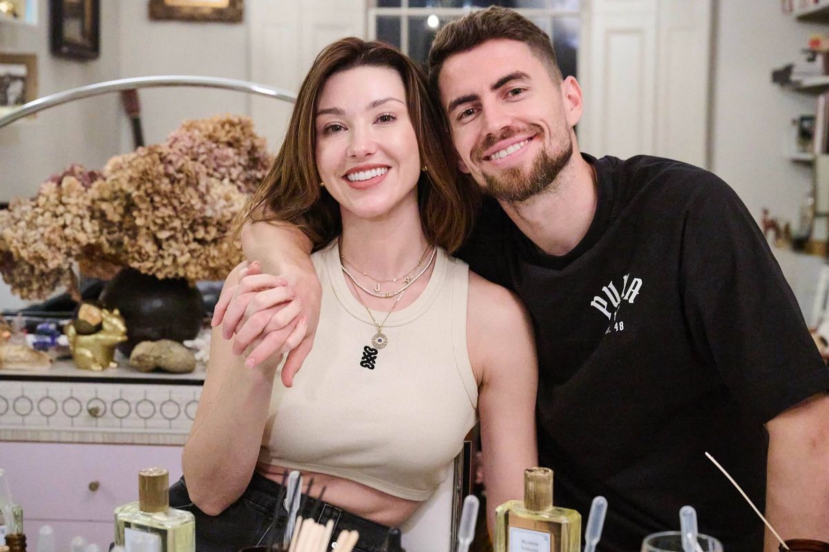 Jorginho and Cat Harding embrace