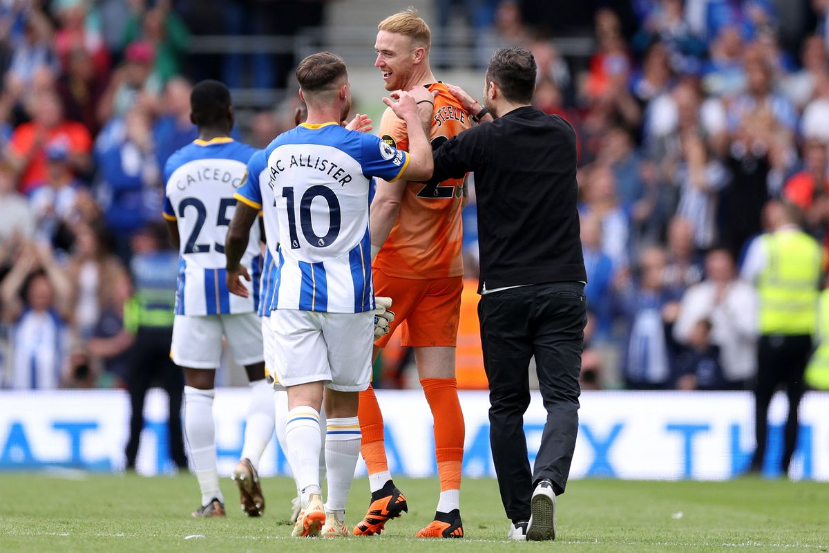 Roberto De Zerbi, Manager of Brighton & Hove Albion, interacts with Jason Steele of Brighton & Hove Albion following the Premier League match between Brighton & Hove Albion and Southampton FC at American Express Community Stadium on May 21, 2023 in Brighton, England.