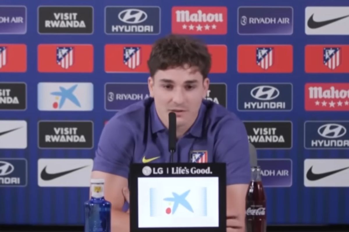 Julian Alvarez speaks during a press conference