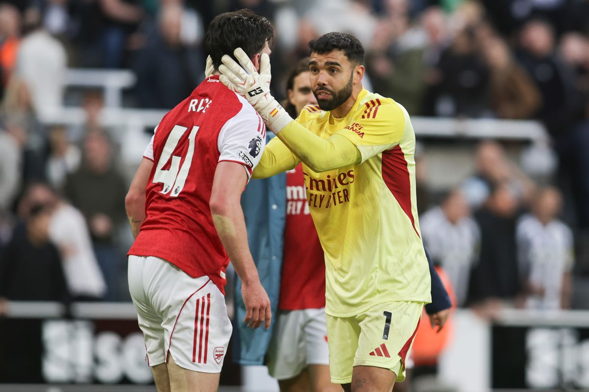 Declan Rice and David Raya of Arsenal celebrate at full time during the Premier League match between Newcastle United and Arsenal at St. James's Park in Newcastle, United Kingdom, on September 28, 2025.