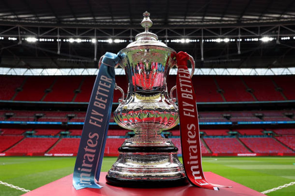LONDON, ENGLAND - MAY 25: A detailed view of the Emirates FA Cup trophy on a plinth on the inside of the stadium prior to the Emirates FA Cup Final match between Manchester City and Manchester United at Wembley Stadium on May 25, 2024 in London, England. (Photo by Eddie Keogh - The FA/The FA via Getty Images)