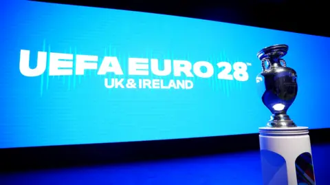 EPA/Shutterstock The Henri Delaunay Trophy on display at the UEFA EURO 2028 tournament launch event in London