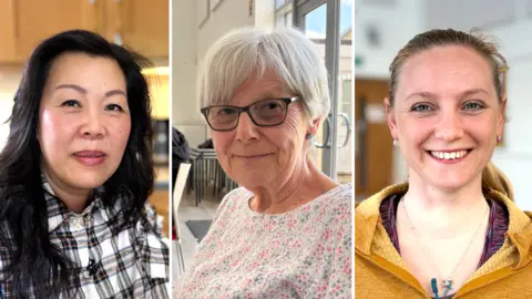 Ben Schofield/BBC A composite image showing Bonnie Yau on the left, Valerie Godfrey in the centre and Rosie Adamson on the right. Bonnie Yau is wearing a checked shirt and has long, wavy black hair falling over her shoulders. Valeria Godfrey has rectangular framed glasses on and has grey hair, worn in a parting and cut relatively short, so it falls just above her ears. She is wearing a white top, patterned with lots of small red and blue flowers. Rosie Adamson is smiling broadly, showing her teeth. She is wearing a yellow zipped top, worn partially open. Her blonde hair is tied back and two small hooped earrings can be seen. 